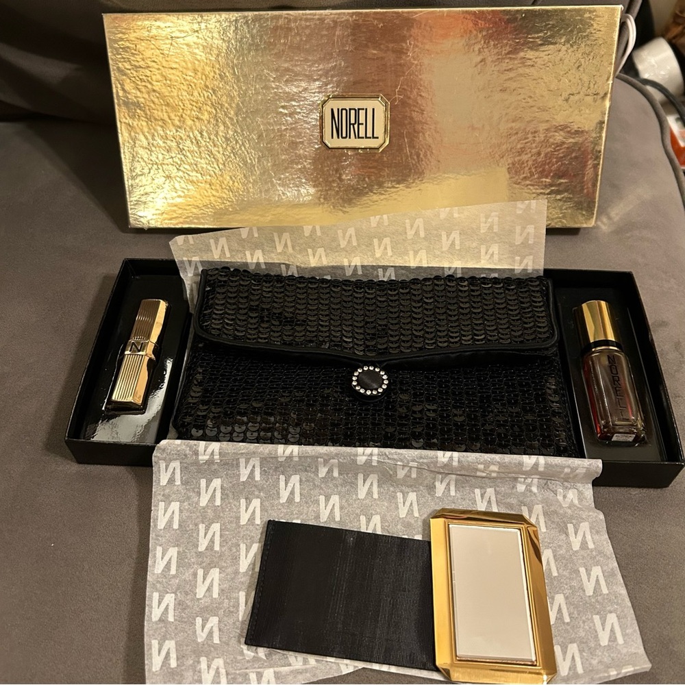 Vintage Norell Gift Set. Perfume, Clutch Purse, Compact Purse Mirror, & Lipstick